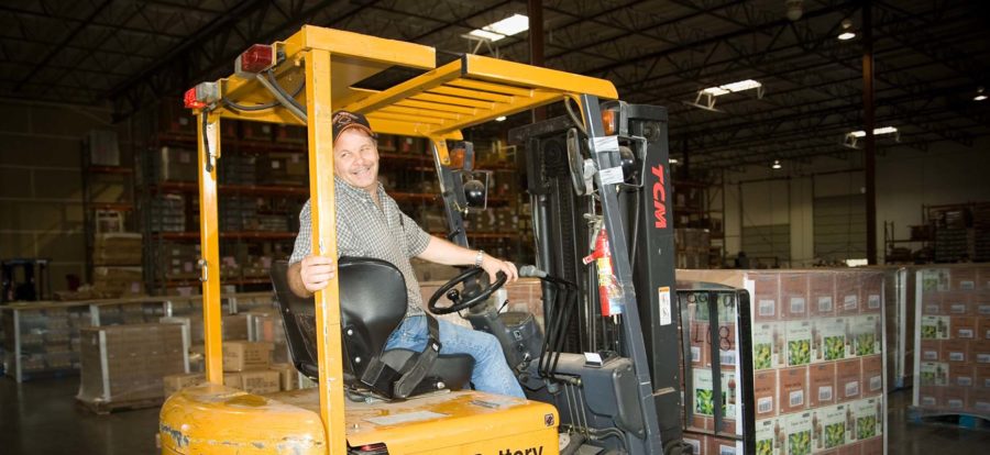 Man driving forklift