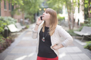 Woman on phone finding good permanent employees