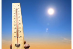 Heat safety - sun and thermometer