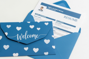 Blue welcome envelope containing professional resume